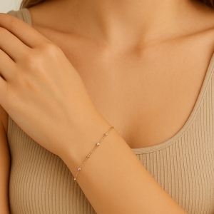 Pulsera bolitas oro amarillo y blanco